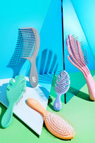 Wet Brush Go Green Mini Detangler Dolaşık Açıcı Saç Fırçası Lila