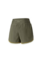 Puma-PUMA X FRIDA KAHLO SHORT Dark Green Moss-Şort-2-roqelvaxirum.shop