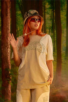 Puma-PUMA x MARKET Relaxed Logo Tee Putty-T-Shirts-1-roqelvaxirum.shop